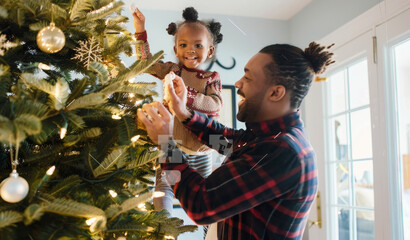 A loving father and daughter joyfully decorating their Christmas tree together during the festive season