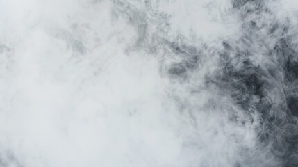 Fototapeta premium Soft gray smoke billows across a white background creating an ethereal atmosphere during a tranquil moment