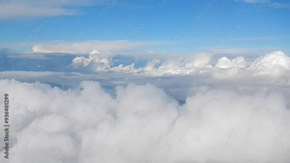 Poster cumulus clouds, horizon of blue sky and brocken spectre with glory and shadow of plane on clouds - a