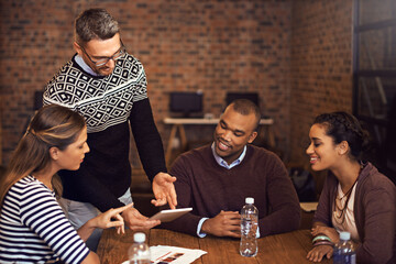 Group of people, tablet and workplace for discussion, presentation or brainstorming in boardroom. Teamwork, technology and career for workshop as colleagues in business meeting, working and together