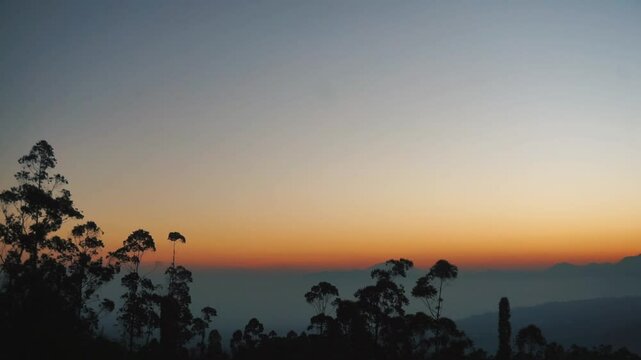 beautiful sunrise in the morning with a view of Mount Cikuray garut indonesia