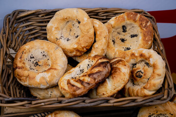 A Collection of Freshly Baked Pastries Arranged Beautifully in a Rustic, Charming Basket for All to Enjoy