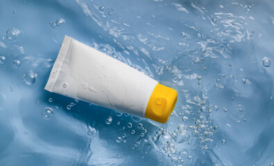 A Sunscreen Tube Happily Floating on the Surface of Clear, Refreshing Water at the Beach