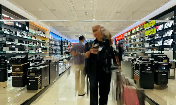 Timelapse of Customers Exploring a Camera Store