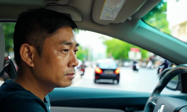 Vietnamese Man Parallel Parking in Busy Urban Street