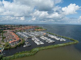 Volendam, North Holland, aerial view over the port and city skyline.