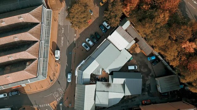 Aerial footage moving towards a large industrial chemical plant