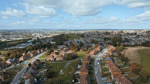 Aerial panoramic view of residential houses in urban neighborhood. Housing estate in town. Yorkshire, UK