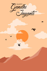 Text Happy Gandhi Jayanti on the background of sky with clouds and sun over mountains. Festive design for greeting card or poster for celebration of Mahatma Gandhi birthday.