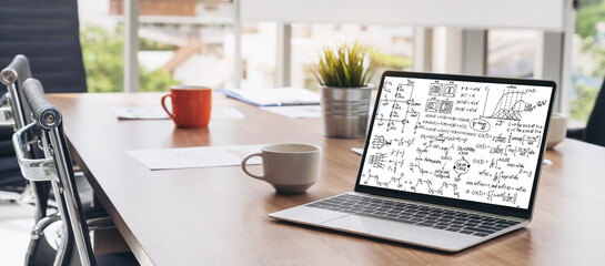 Mathematic equations and modish formula on computer screen showing concept of science and education