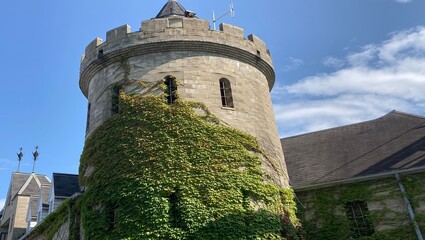Tower part of stone castle at amusement park