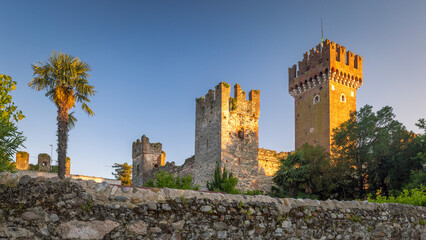 Obraz premium Castle of Lazise at sunset, in town on shore of Lake Garda, Italy, Europe.