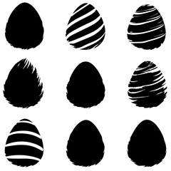 A collection of black and white Easter eggs featuring various intricate designs