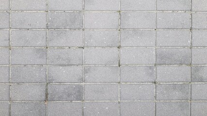 Gray brick texture image. Gray bricks grid floor texture background. Top view. Pattern, grid