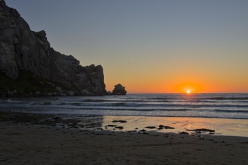 The sun sets over the Pacific in Morro Bay, California