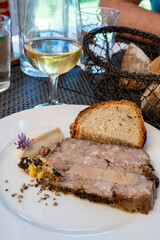 Terrine foie gras fat liver specialty food product made of liver of a duck or goose fattened by force feeding, served in French restaurant in Perigoed, Dordogne, close up