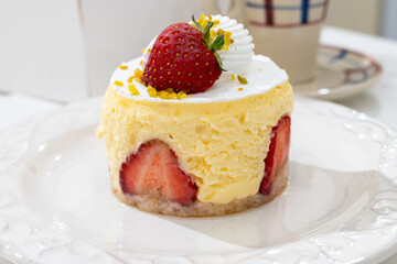 Red fruit sweet dessert cheesecake tart with fresh strawberries in bakery