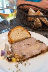 Terrine foie gras fat liver specialty food product made of liver of a duck or goose fattened by force feeding, served in French restaurant in Perigoed, Dordogne, close up