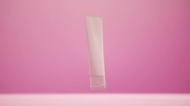 Cosmetic cream tube isolated on pink background. Bottle rotates slowly in air. Women's cosmetics skincare. Sample of layout of package beauty product