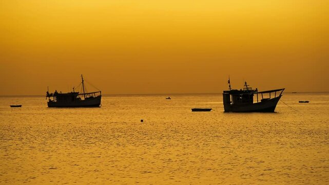 Fishing boats in Juan Griego Bay at sunset. Margarita Island, Nueva Esparta State. Venezuela