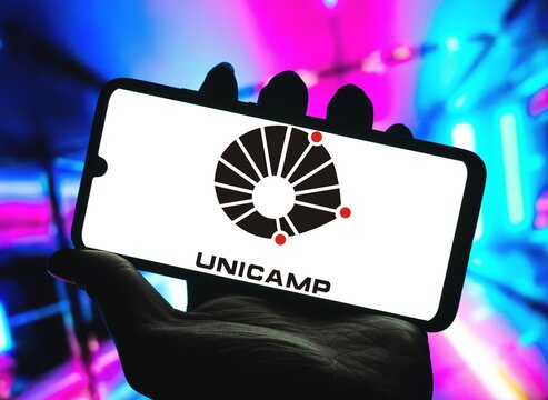 Photo illustration of the Unicamp Brazilian university logo is displayed on a smartphone screen, Umuarama August 25, 2024	