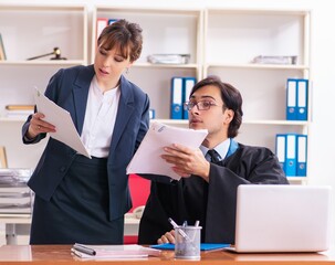 Two lawyers working in the office