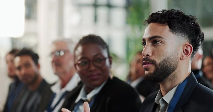 Raised hand, meeting and businessman in office with question for corporate finance forecasting. Presentation, seminar and team of financial advisors in conference with asking gesture in workplace.