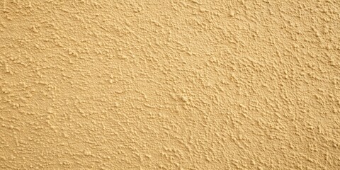 A vintage beige painted wall texture perfect for backgrounds and overlays