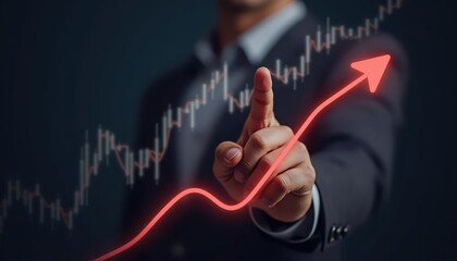 A business professional points to a rising graph, symbolizing growth and success in finance and investment sectors.