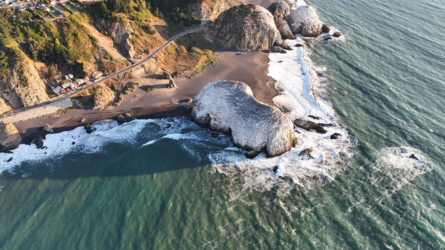Large rocks natural monument Piedra de Iglecias Church stone on Chilean coast in Constitucion in sunset.