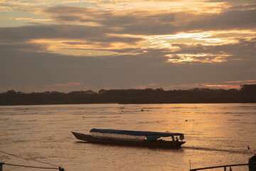 Canoe on Amazon River at Sunset