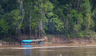 Boat Docked Along the Amazon Riverbank