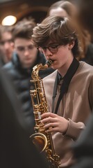 Obraz premium Saxophone Solo at School Band Rehearsal