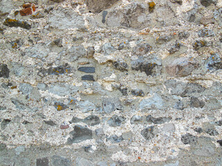 Brick mortar weathered stone rock wall background texture rough