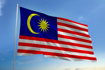 Malaysia's national flag waving in the blue sky. flag for Independence Day.
