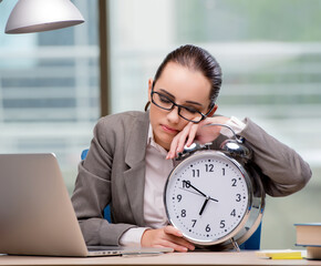 Businesswoman failing to meet challenging deadlines
