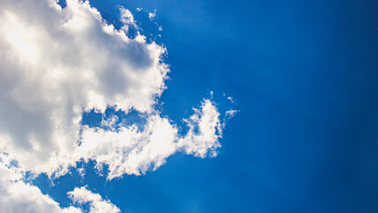 White clouds against a blue sky