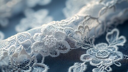 Naklejka premium Elegant white lace fabric texture with delicate floral patterns, blending sophistication with intricate details.