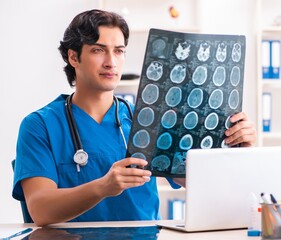 Young male doctor radiologist working at the clinic
