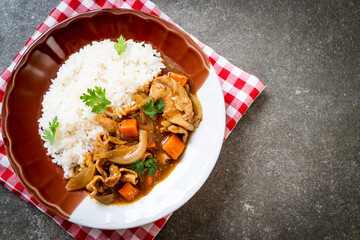 Japanese curry rice with sliced pork, carrot and onions