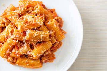 Rigatoni pasta bolognese with cheese