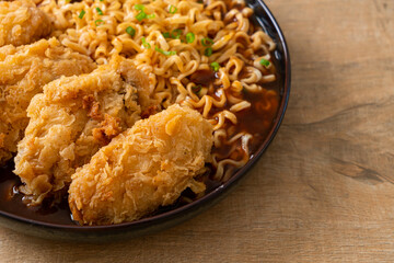 Korean instant noodles with fried chicken or Fried chicken ramyeon