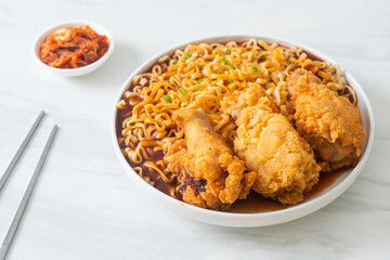 Korean instant noodles with fried chicken or Fried chicken ramyeon
