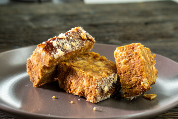 Tasty candies sweet cake anthill on a black background. Dessert. food concept