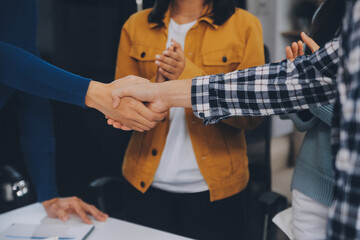 Fototapeta premium portrait of Business people shaking hands, finishing up a meeting