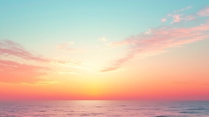 Pink and orange sunset over the ocean with a cloudy sky, creating a stunning and vibrant natural landscape at the close of the day.