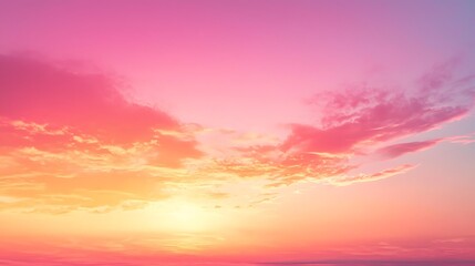 Fototapeta premium Pink and orange sunset sky with clouds, blending warm and cool tones in a visually striking and serene evening scene.