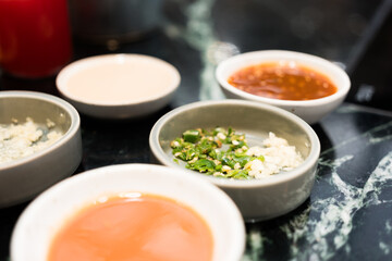 Set of condiments for Shabu and Sukiyaki