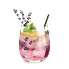 Glass of fresh lavender lemonade with mint and flowers on white background