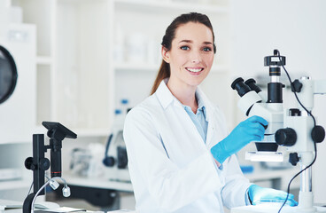 Portrait, scientist and microscope in science laboratory for medical research, biology or...